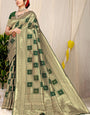 Sizzling Dark Green Kanjivaram Silk Saree With Glittering Blouse Piece