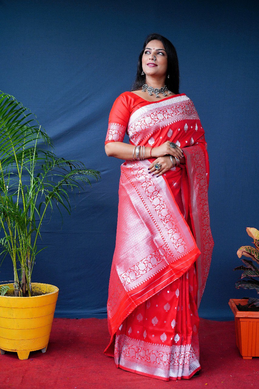 Tremendous Red Banarasi Silk Saree With Symmetrical Blouse Piece