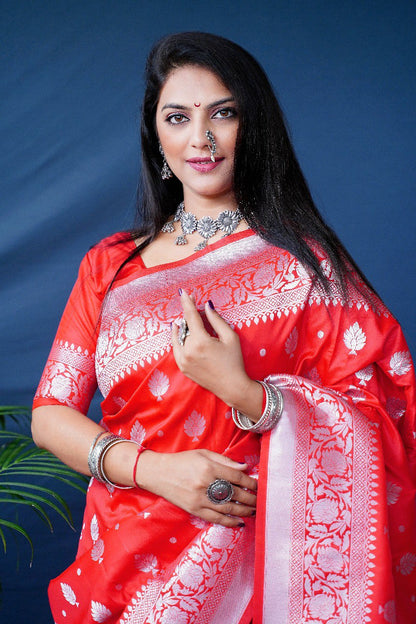 Tremendous Red Banarasi Silk Saree With Symmetrical Blouse Piece
