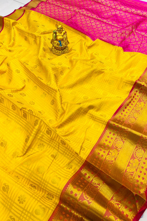 Load image into Gallery viewer, Demanding Yellow Soft Banarasi Silk Saree With Elision Blouse Piece
