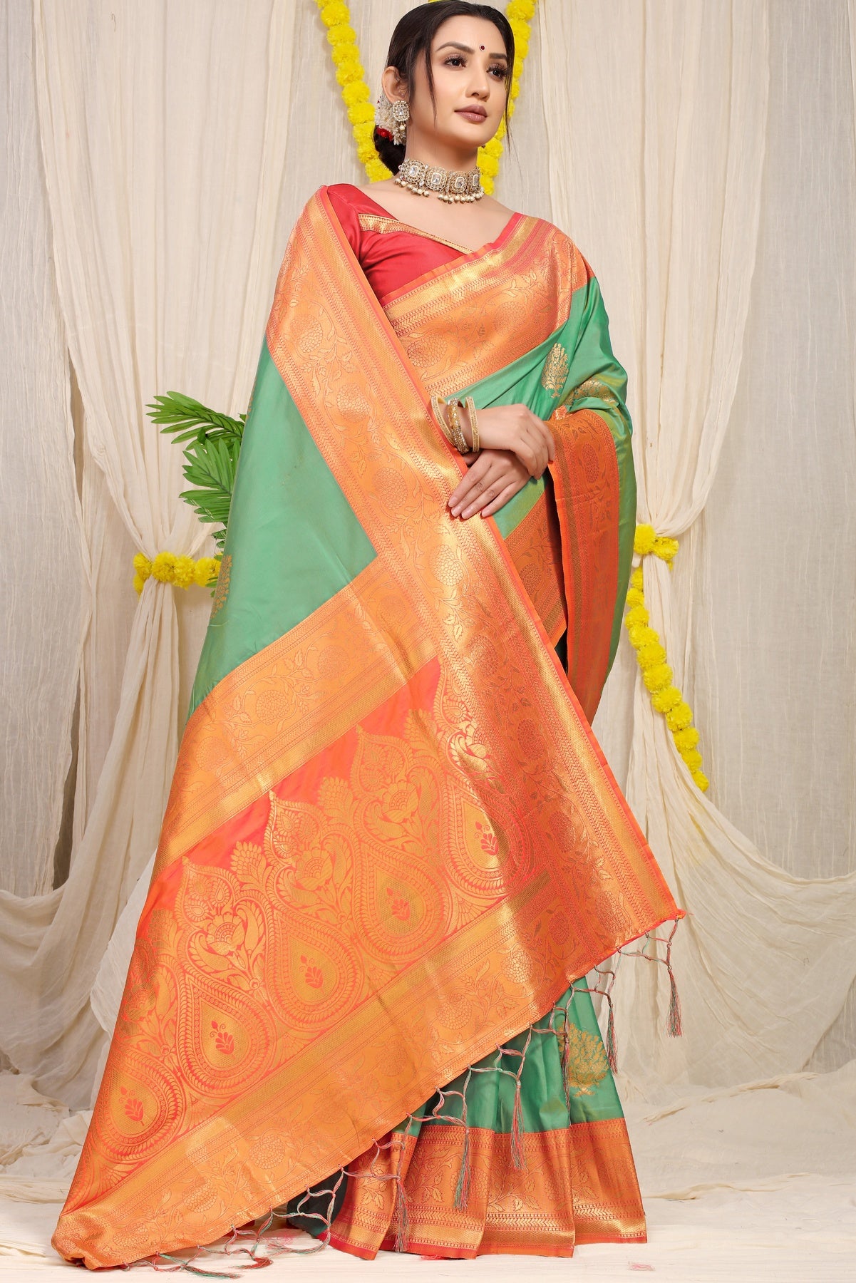 Gleaming Sea Green Banarasi Silk Saree With Forbearance Blouse Piece