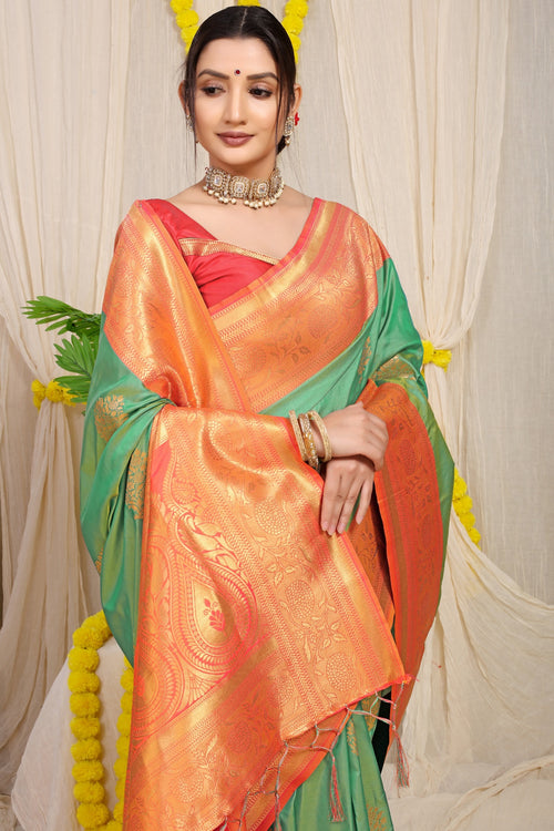 Load image into Gallery viewer, Gleaming Sea Green Banarasi Silk Saree With Forbearance Blouse Piece
