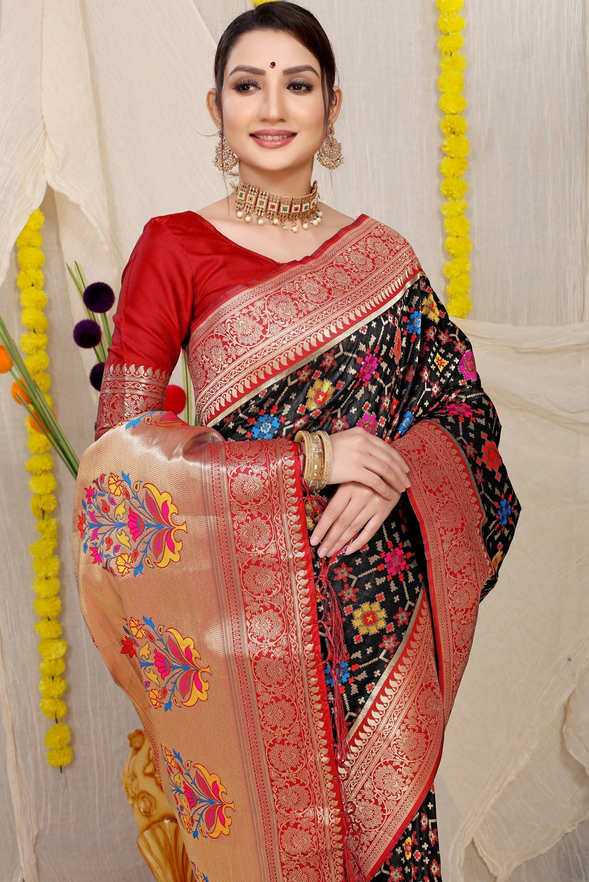 Attractive Black Soft Patola Silk Saree with Demanding Blouse Piece