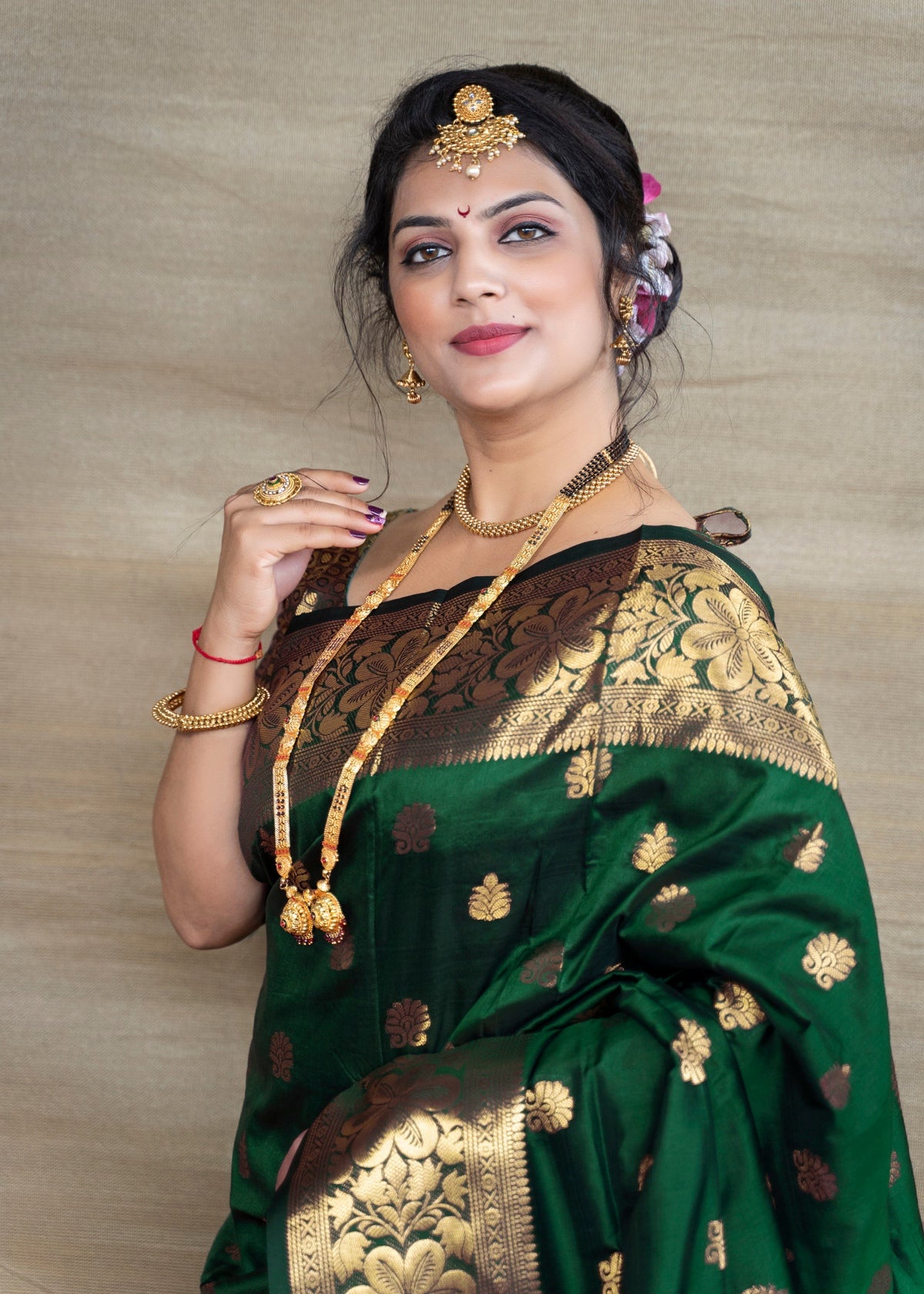 Prettiest Dark Green Banarasi Silk Saree With Assemblage Blouse Piece