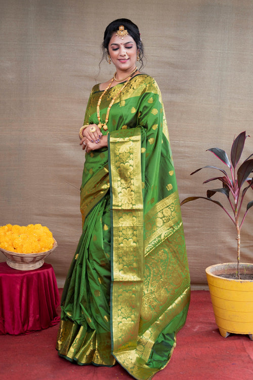 Load image into Gallery viewer, Preferable Green Banarasi Silk Saree With Assemblage Blouse Piece
