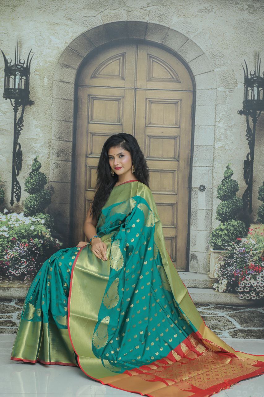 Diaphanous Firozi Banarasi Silk Saree With Flameboyant Blouse Piece