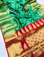 Effervescent Green Banarasi Silk Saree With Flameboyant Blouse Piece