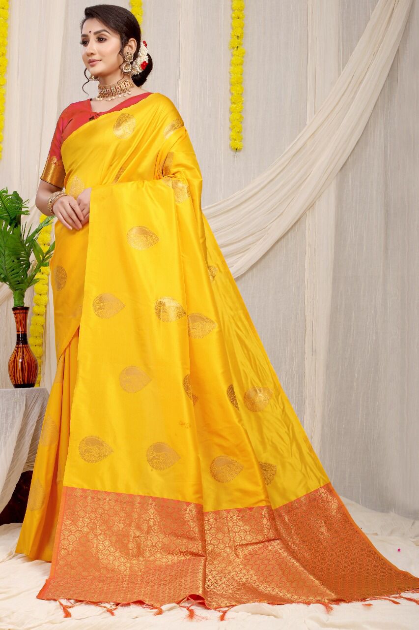 Adorning Yellow Banarasi Silk Saree With Adorable Blouse Piece