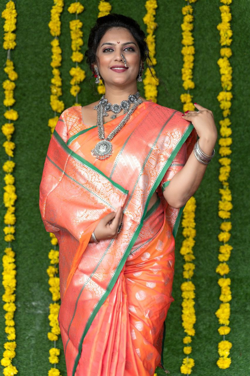 Innovative Orange Banarasi Silk Saree With Symmetrical Blouse Piece
