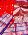 Adoring Red Banarasi Silk Saree With Admirable Blouse Piece