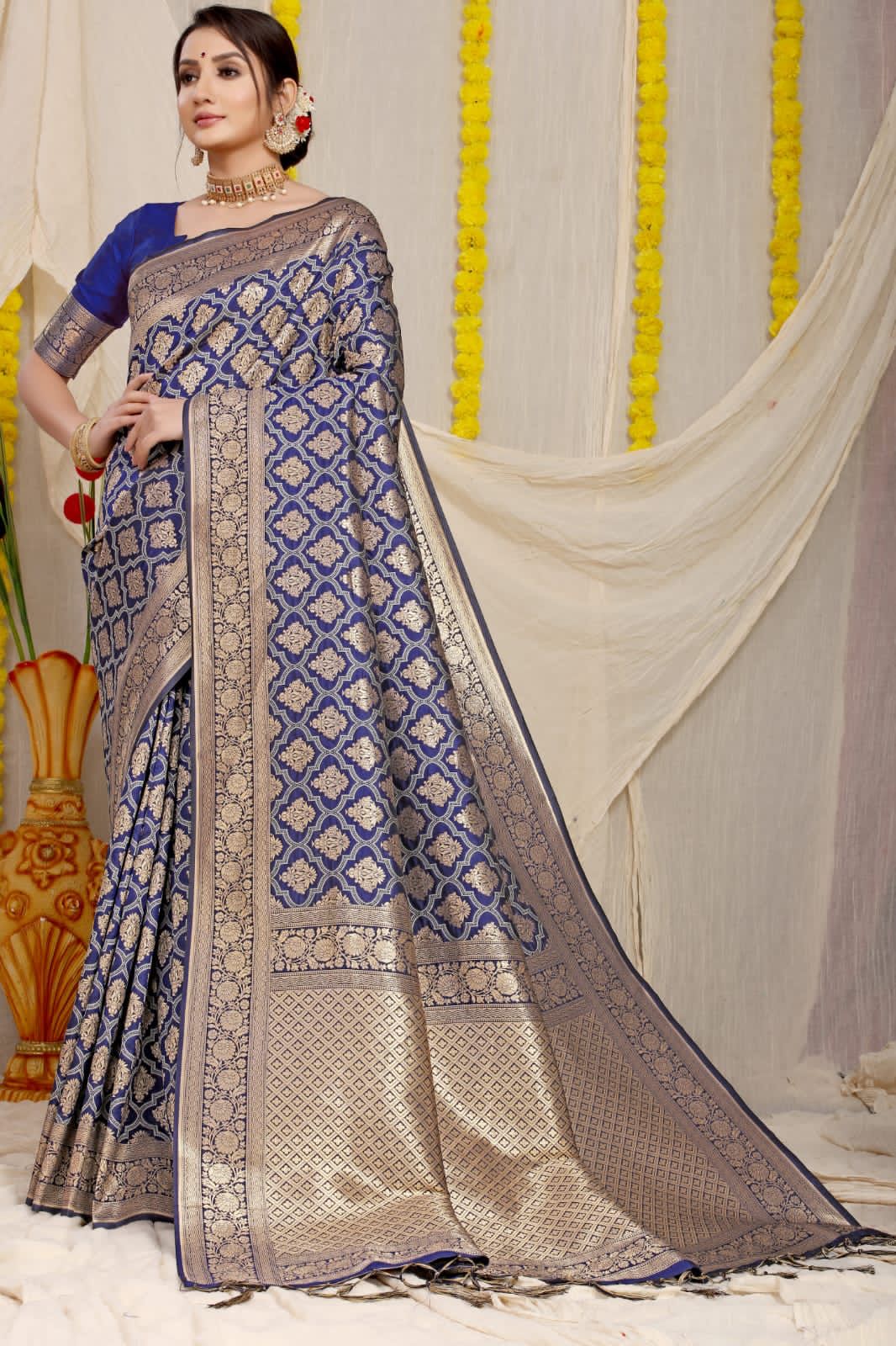 Staring Navy Blue Soft Banarasi Silk Saree With Bewitching Blouse Piece