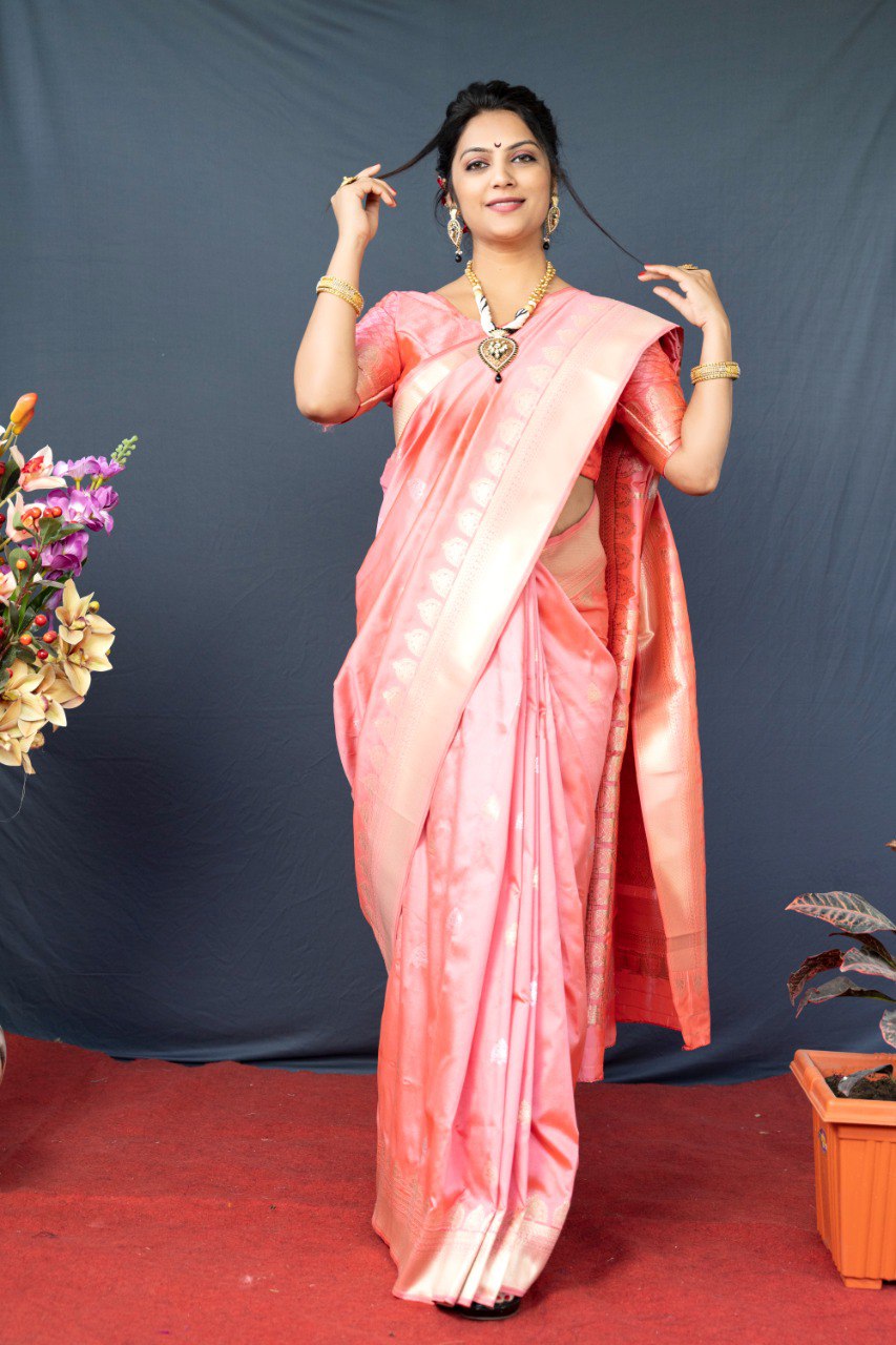 Adorning Baby Pink Banarasi Silk Saree With Classic Blouse Piece