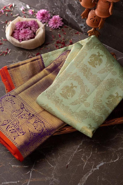 Seraglio Sea Green Soft Banarasi Silk Saree With Divine Blouse Piece