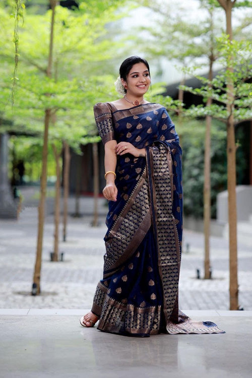 Load image into Gallery viewer, Surpassing Navy Blue Soft Banarasi Silk Saree With Glowing Blouse Piece
