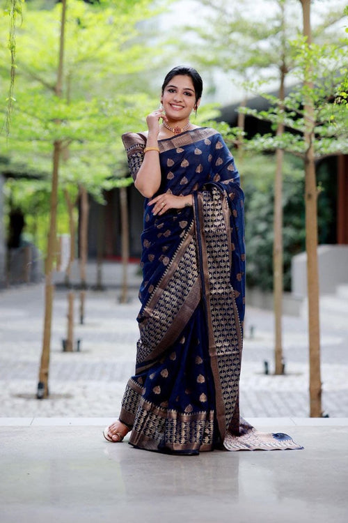 Load image into Gallery viewer, Surpassing Navy Blue Soft Banarasi Silk Saree With Glowing Blouse Piece
