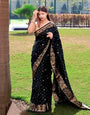 Staggering Black Soft Banarasi Silk Saree With Lagniappe Blouse Piece