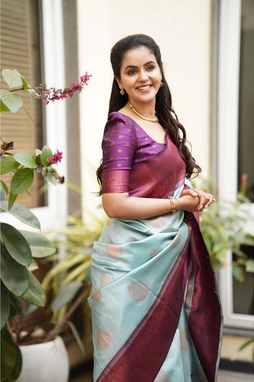 Load image into Gallery viewer, Magnetic Sky Soft Silk Saree With Felicitous Blouse Piece
