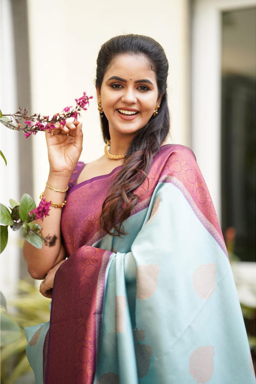 Load image into Gallery viewer, Magnetic Sky Soft Silk Saree With Felicitous Blouse Piece
