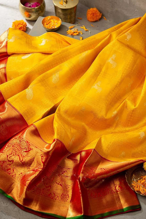 Load image into Gallery viewer, Brood Yellow Soft Banarasi Silk Saree With Cynosure Blouse Piece
