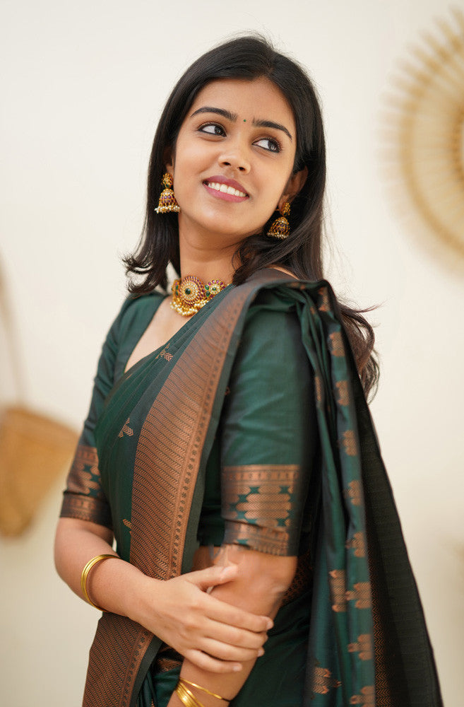 Invaluable Dark Green Soft Silk Saree With Desiring Blouse Piece