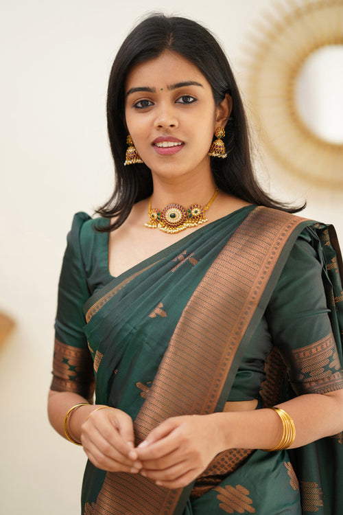 Load image into Gallery viewer, Invaluable Dark Green Soft Silk Saree With Desiring Blouse Piece
