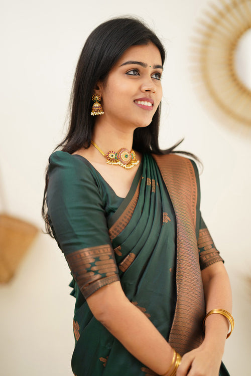 Load image into Gallery viewer, Invaluable Dark Green Soft Silk Saree With Desiring Blouse Piece
