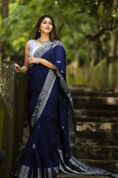 Charming Navy Blue Soft Banarasi  Silk Saree With Glowing Blouse Piece