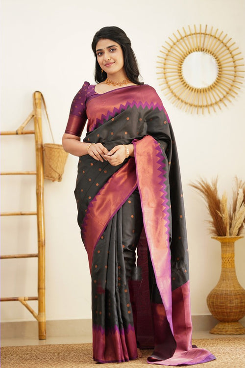 Load image into Gallery viewer, Flaunt Black Soft Banarasi Silk Saree With Gleaming Blouse Piece
