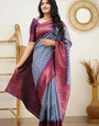 Sensational Grey Soft Banarasi Silk Saree With Gleaming Blouse Piece