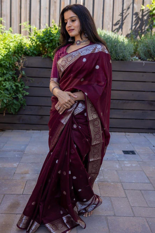 Load image into Gallery viewer, Efflorescence Maroon Soft Banarasi Silk Saree With Unique Blouse Piece
